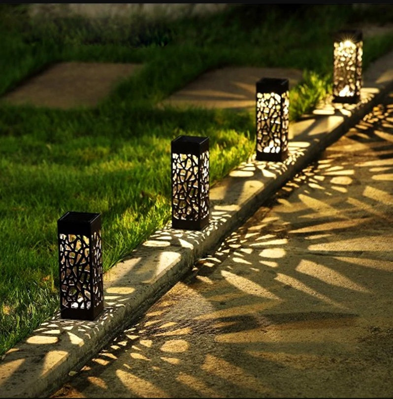 Solar Garden Pathway Stake Lights | Hollow-Carved Shell | 2LM | 3000K & Cool White | 300mAh | 4–10hr Runtime | Auto Dusk-to-Dawn | Waterproof | 6×6×28.5cm | 1–12pc Packs