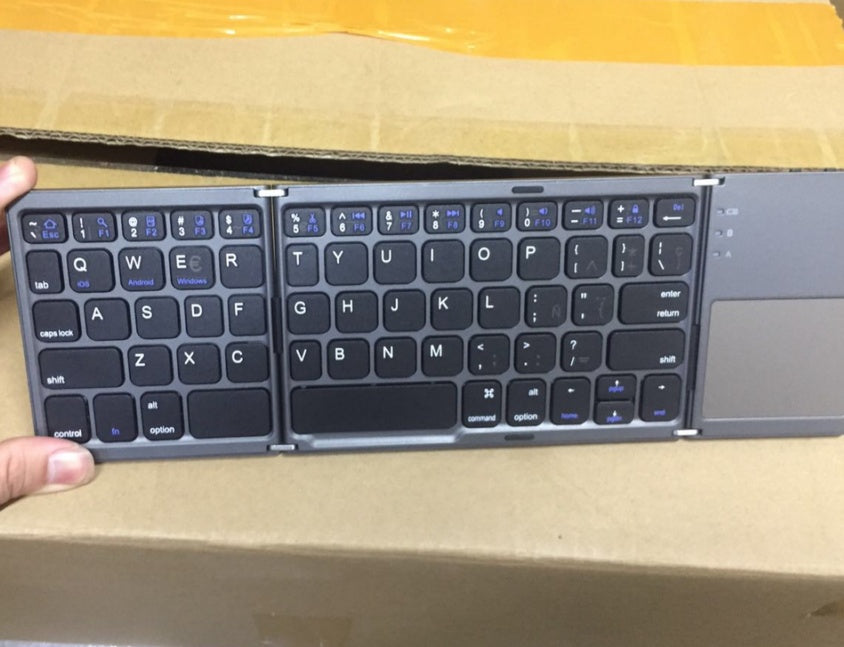 Tri-Fold Bluetooth Keyboard with Touchpad | Bluetooth 3.0 | 100hr Battery | Apple, Android & Windows | Black & Silver | English & Spanish
